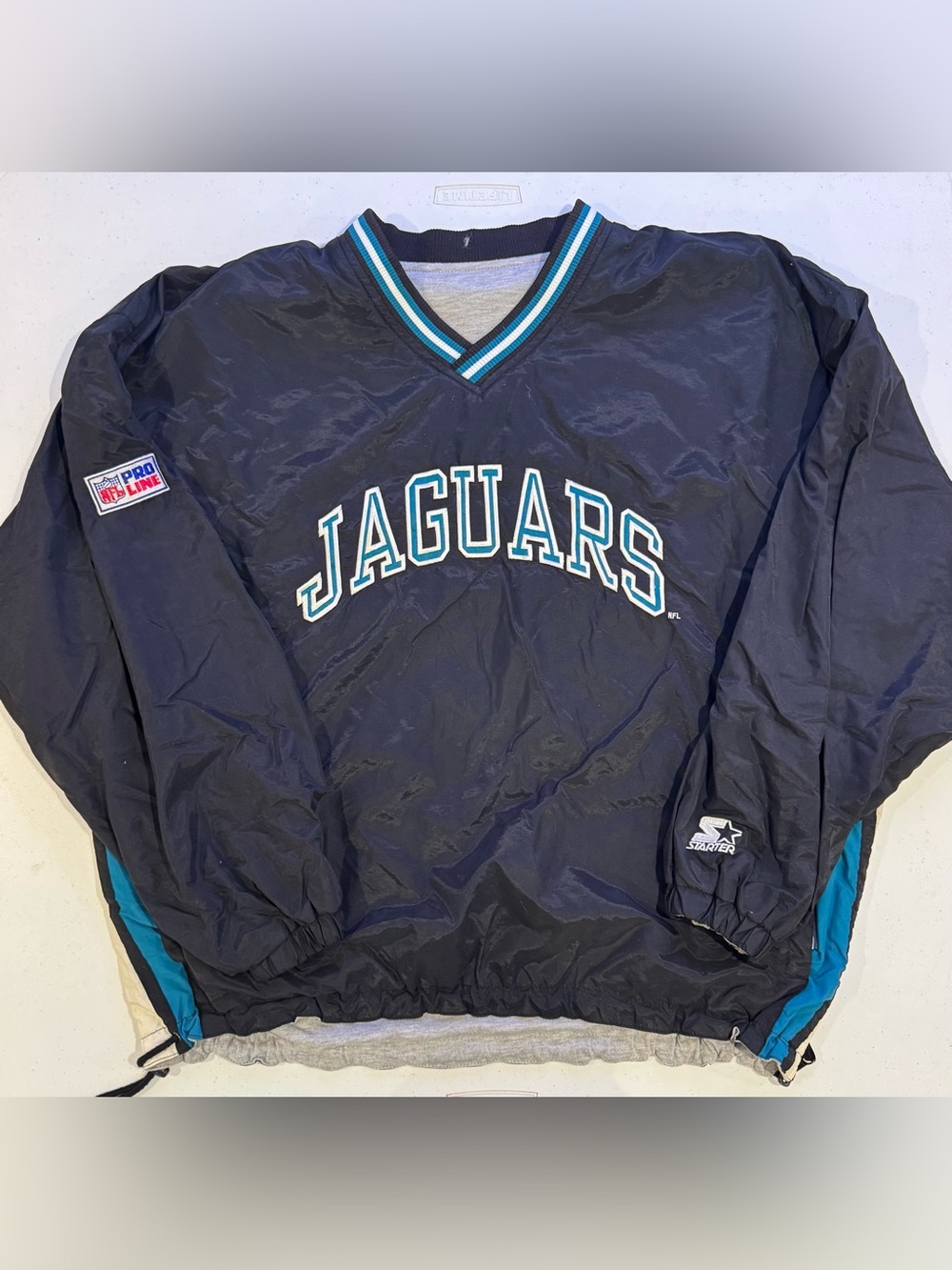Vintage 90’s STARTER Jacksonville Jaguars Pullover Reversible Jacket size XL NFL